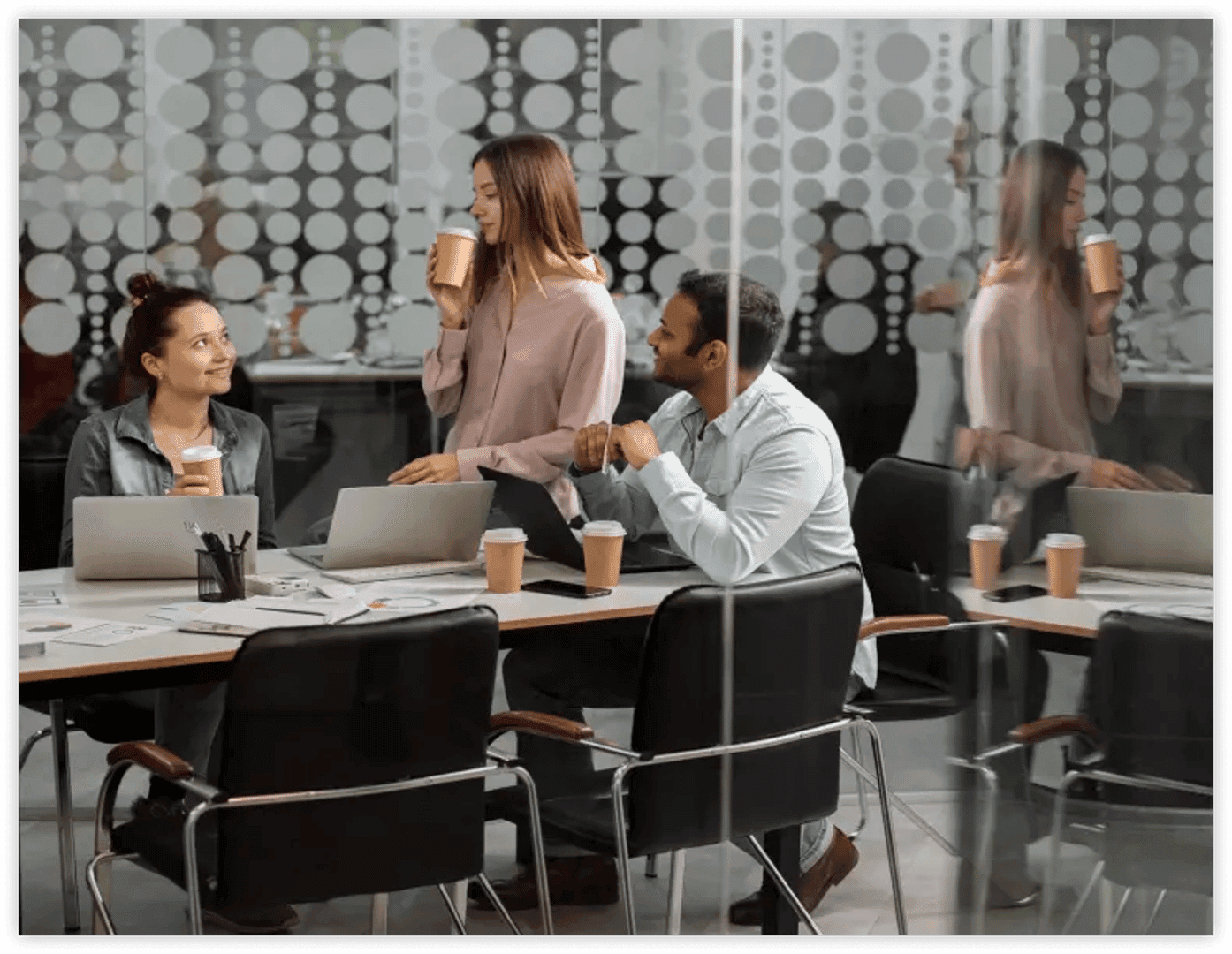 a group of people sitting at a table